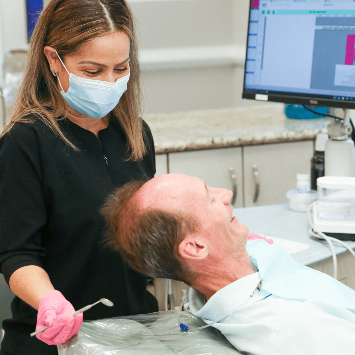 patient getting dental work done